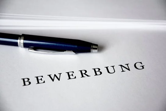 Bewerbungsmappe mit Stift